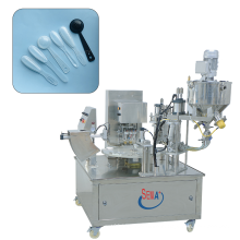 Automatic hand throwing honey spoon packaging machine honey spoon filling sealing packaging machine